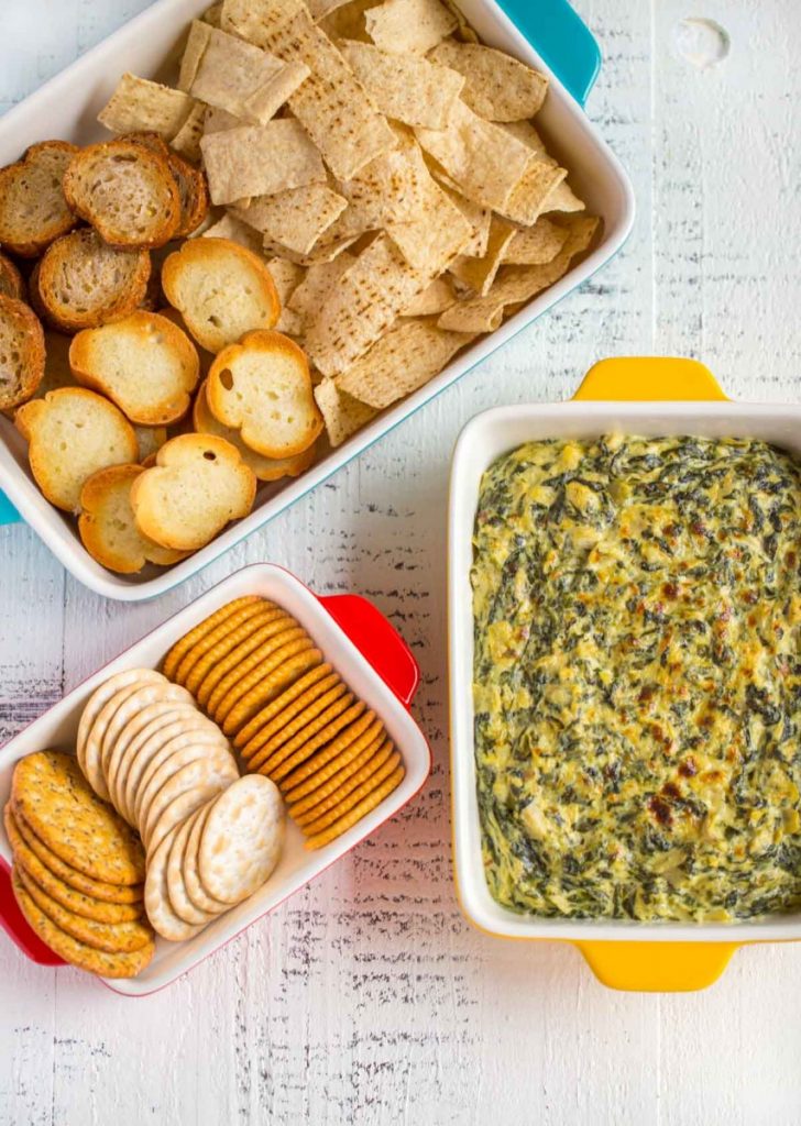 Spinach Artichoke Dip served in an appetizer baking dish.