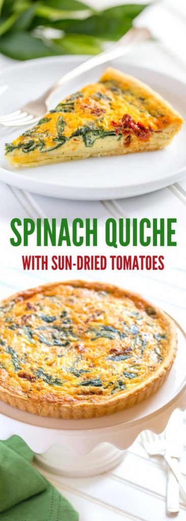 Spinach Quiche with Sun-Dried Tomatoes served on a white cake stand.