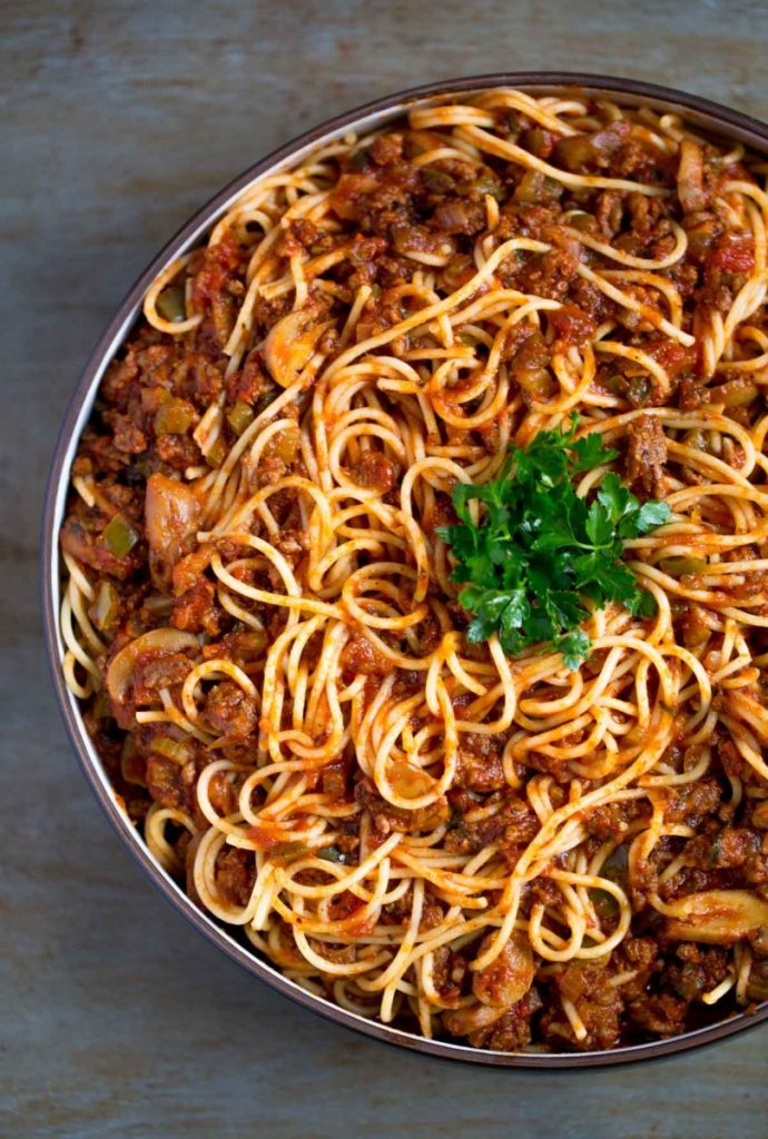Spaghetti meat sauce with pasta in a serving bowl