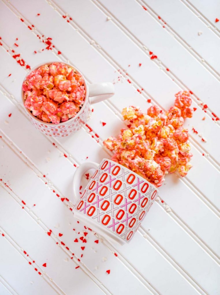 Old fashioned pink candied popcorn in a bowl.
