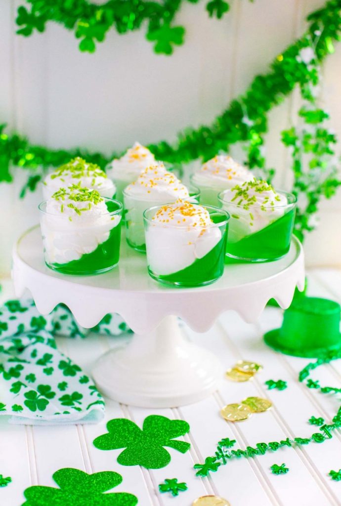 Green-and-white Jello in a cup desserts.