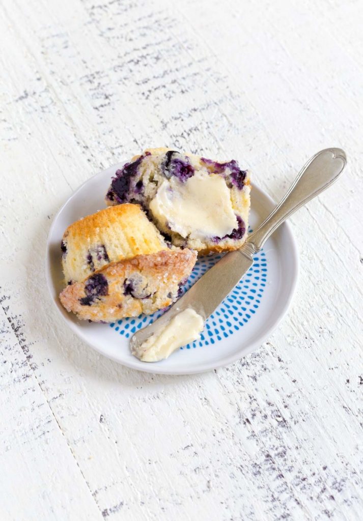 Jordan Marsh Blueberry Muffins with a pat of butter