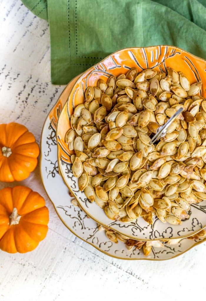 Crispy Roasted Pumpkin Seeds on a tiered serving tray.