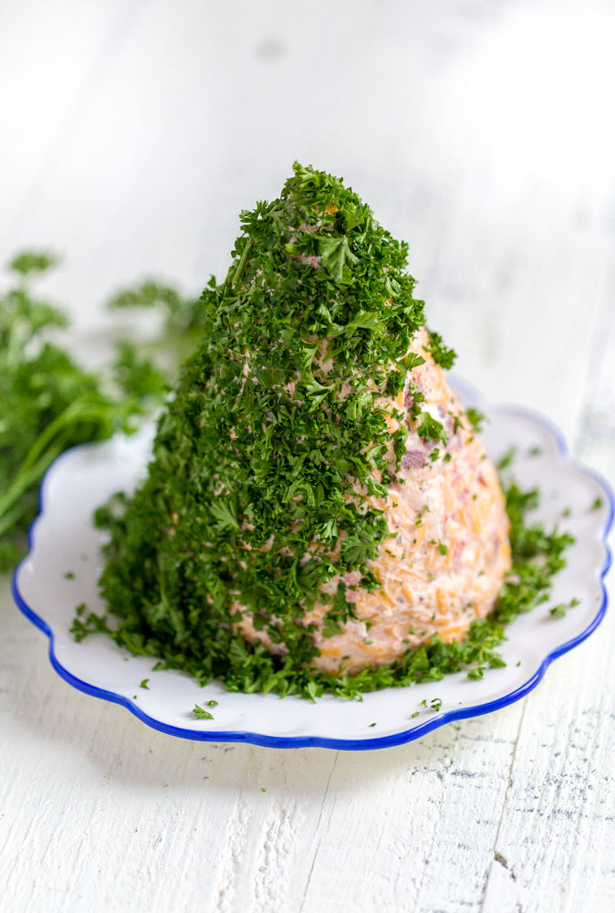 Cheese ball covered in parsley