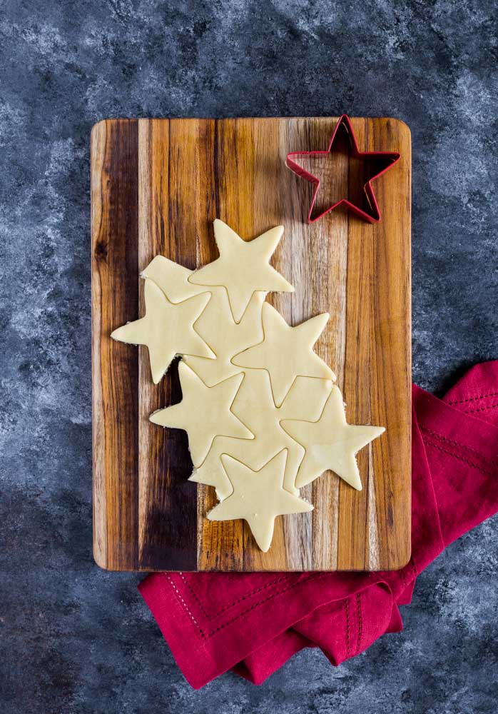 Sugar Cookies on a cutting board.
