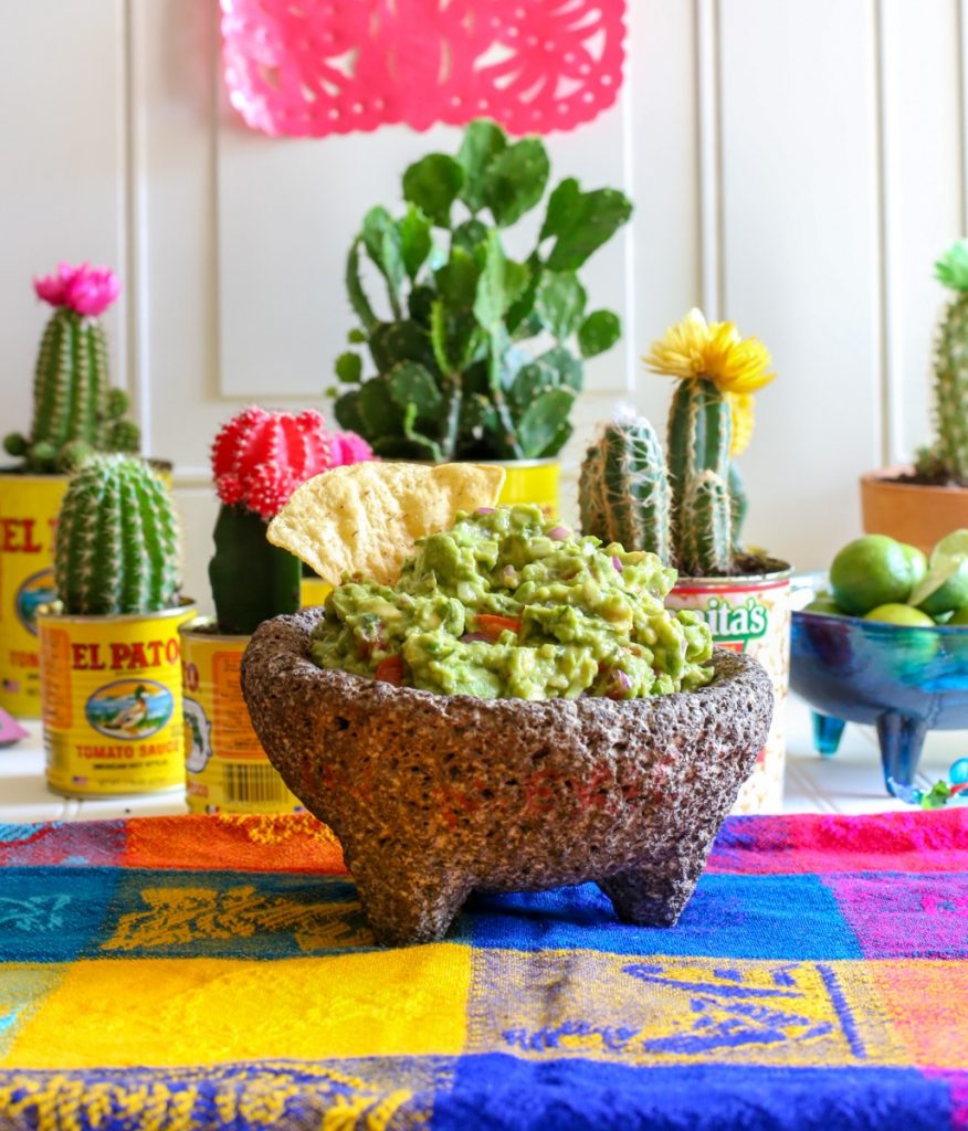 Authentic Mexican Guacamole served in a large Mexican molcajete. 