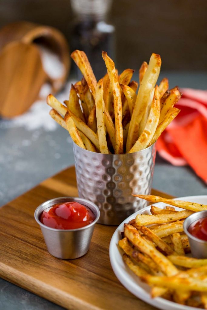 Best Oven Baked Fries served with a side of ketchup. 