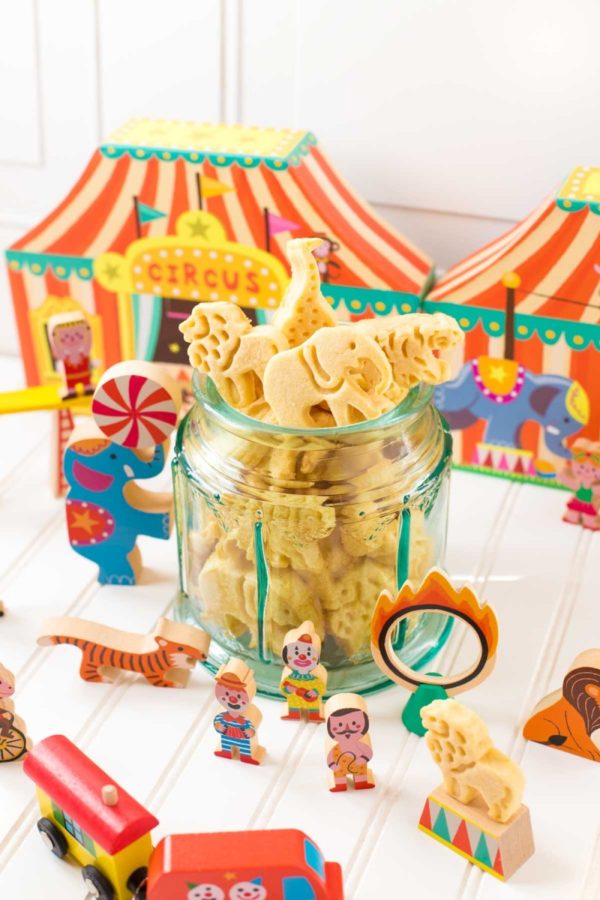 Animal Crackers served in a clear carousel cookie jar.