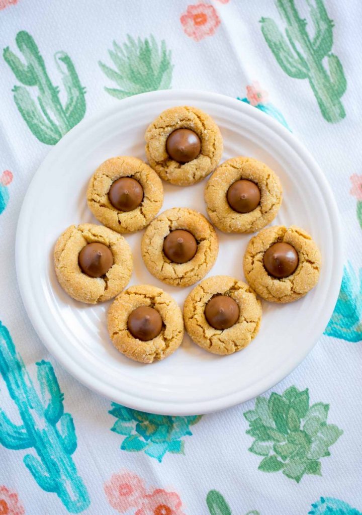 Peanut Butter Blossoms Recipe made with creamy peanut butter and Hershey's kisses.
