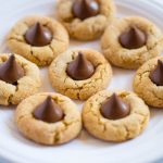 Peanut Butter Blossom Cookies served with tea.