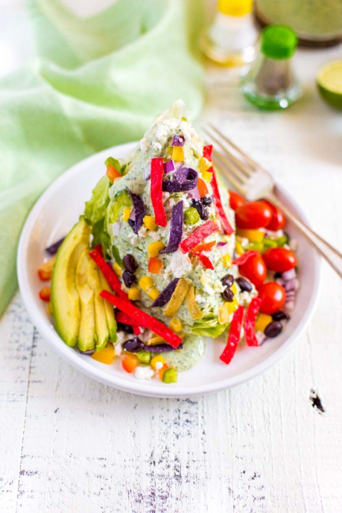 Wedge Salad Recipe served with colorful ingredients.