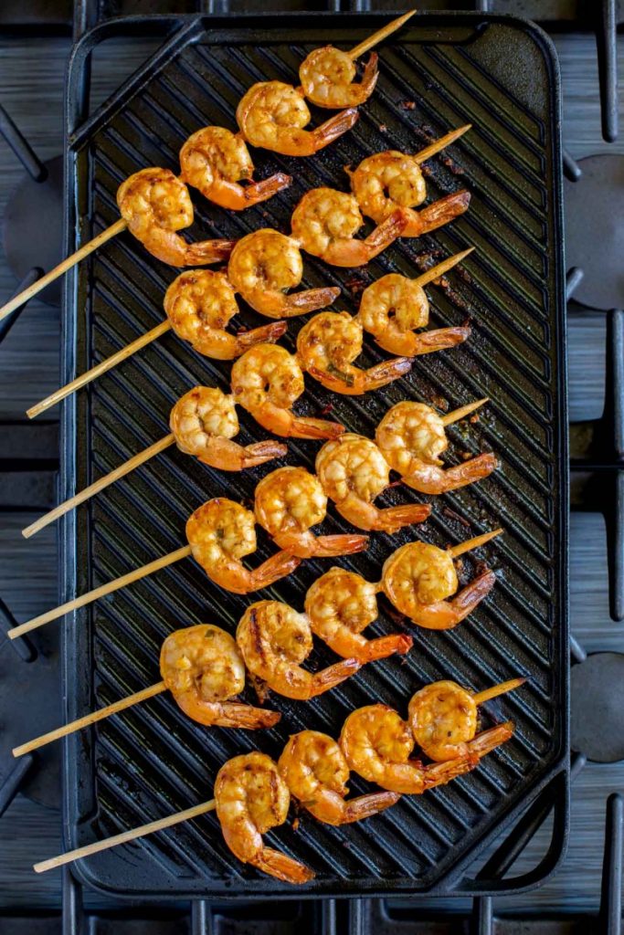 Grilled shrimp skewers on an indoor grill.