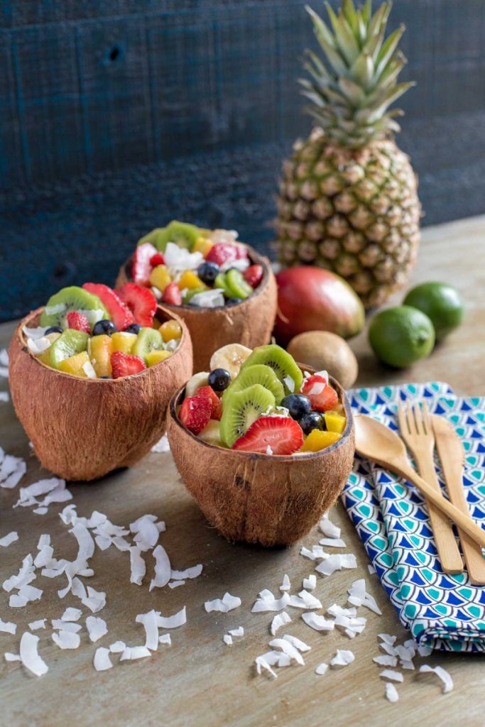 Cool and refreshing fruit salad served in coconut shell bowls.