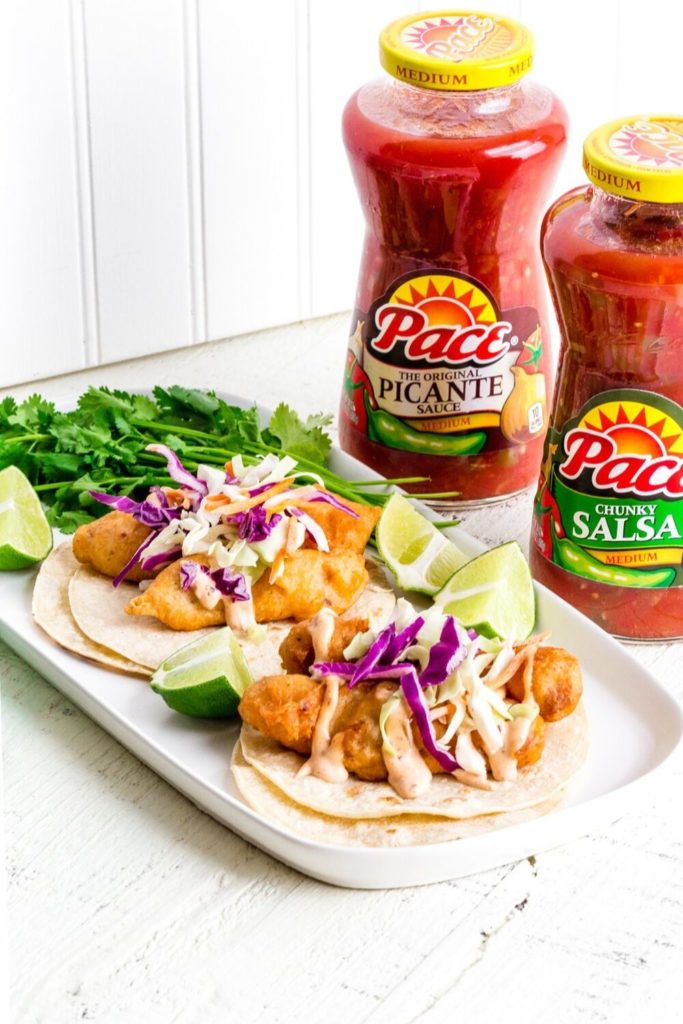 Beer-battered Baja Fish Tacos with chipotle mayo and slaw.