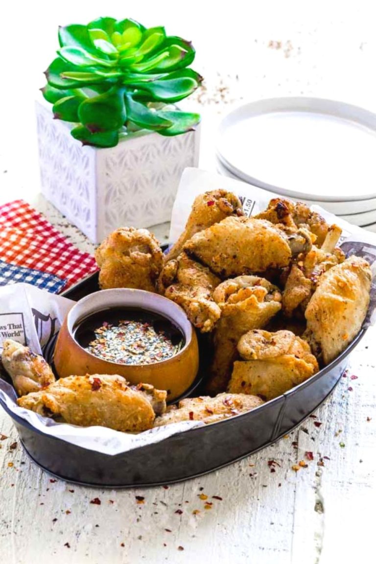 Crispy Air Fryer Chicken Wings in a restaurant serving basket.