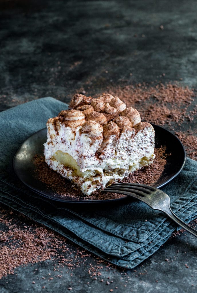 Tiramisu cheesecake dusted in finely-grated chocolate.