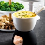 Cheese fondue in a Boska fondue pot over a tea-light burner.