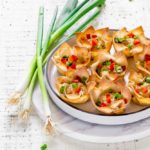 Baked wonton cups filled with a delicious crabmeat mixture.