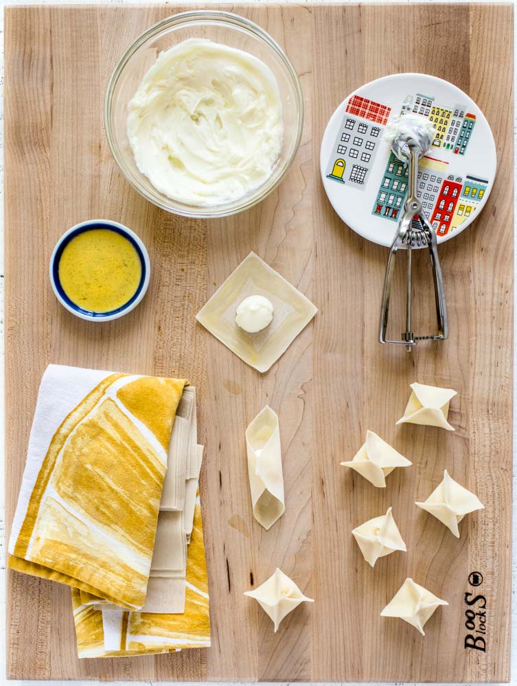 Image shows how to fold a cheese wonton, step by step.