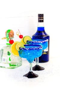 Blue Margarita in a blown-glass Mexican Margarita glass with a blue rim.