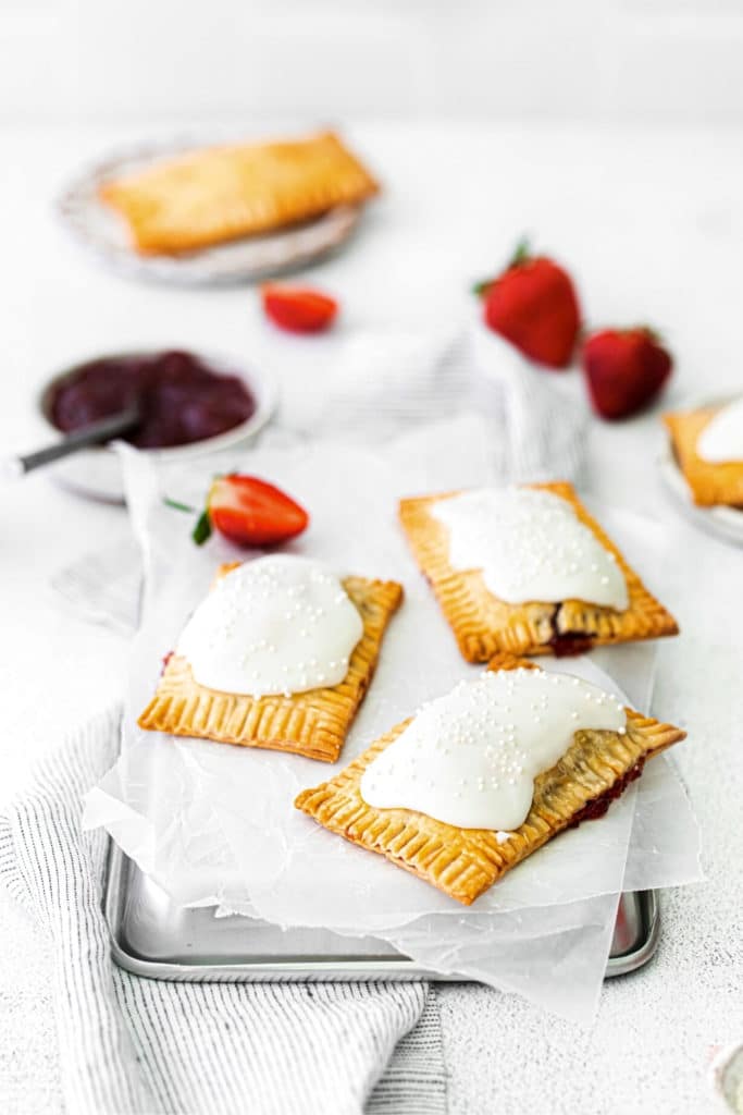 Homemade toaster pastries on a breakfast table.
