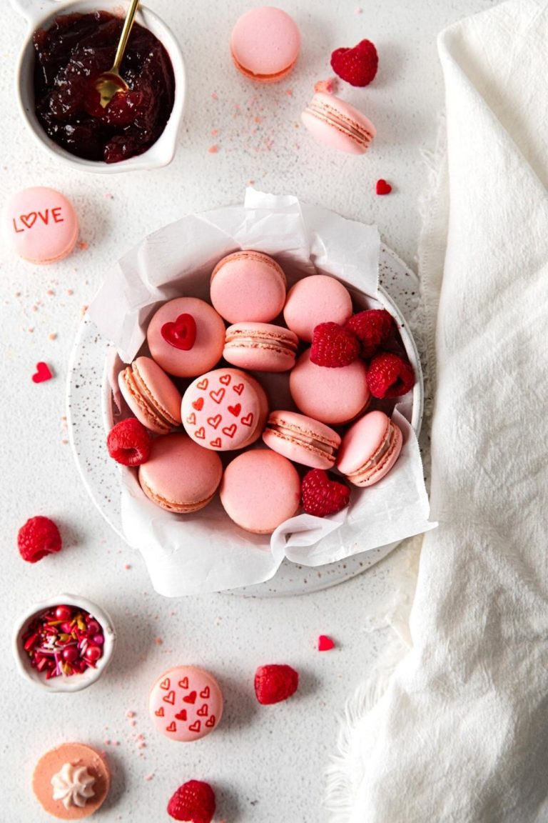 Pink Valentine's Day Macarons with luscious raspberry filling.
