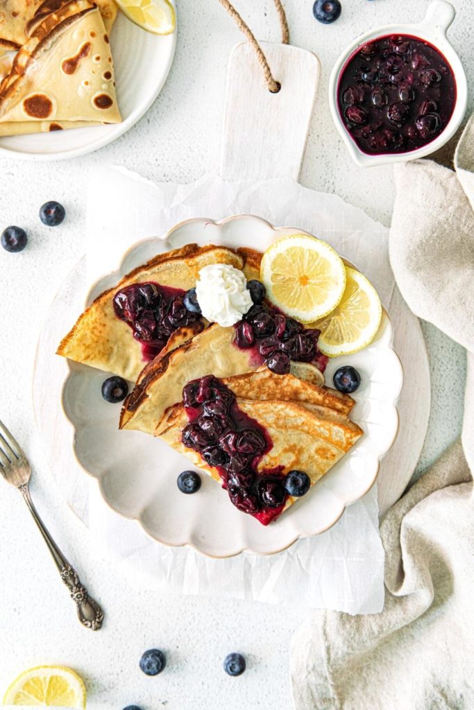 Blueberry compote over lemon crepes.