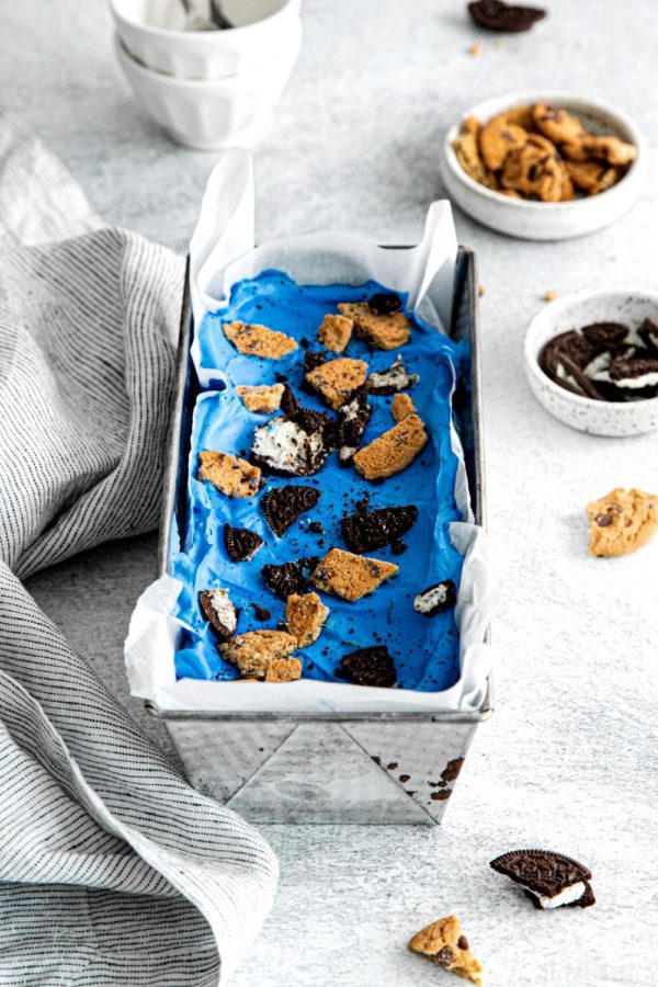 Blue cookie monster ice cream in a rectangular metal loaf pan.