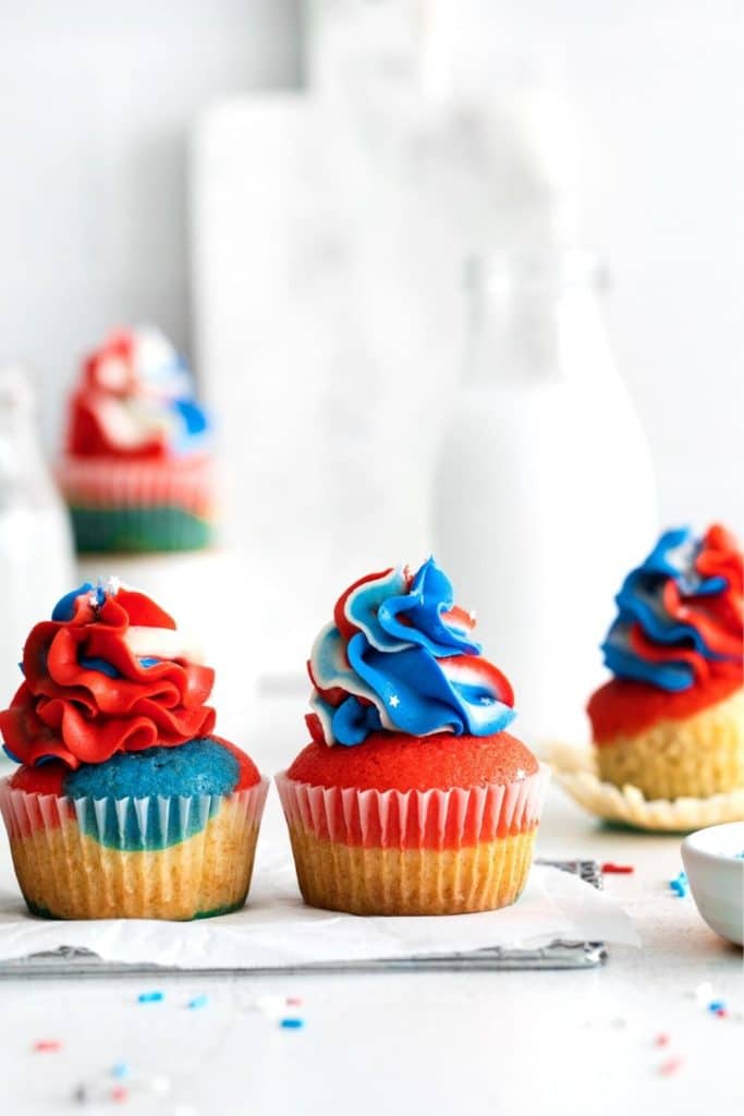 Freshly frosted fourth of July cupcakes.