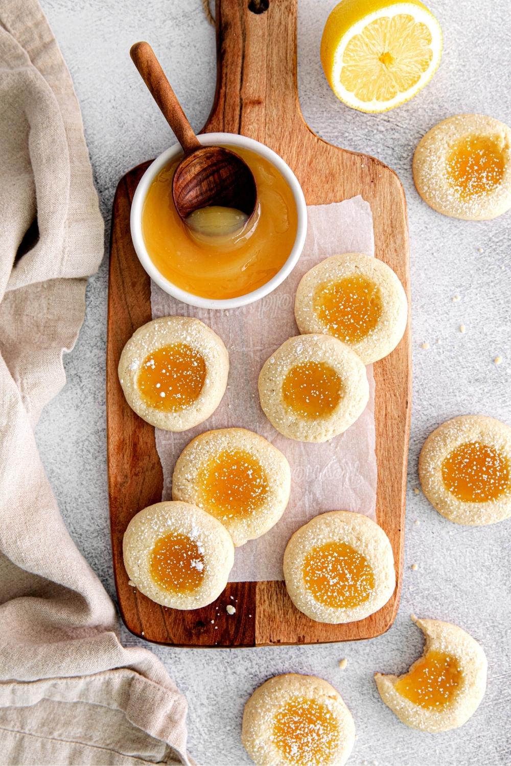Ten lemon Curd Cookies sprinkled with powdered sugar.