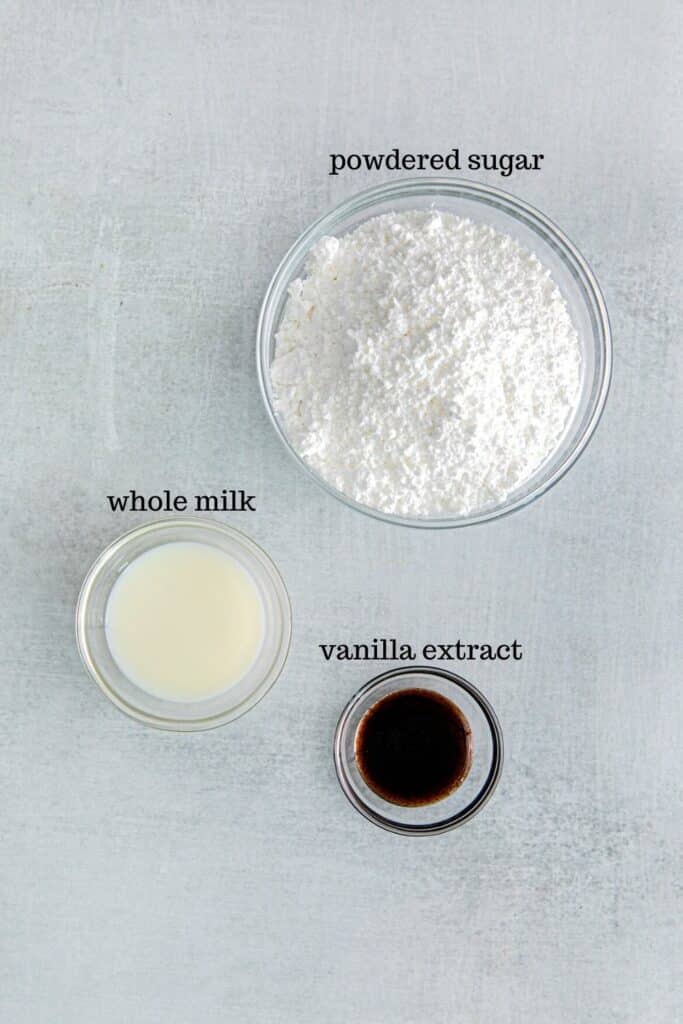 Ingredients for vanilla glaze: powdered sugar, whole milk, vanilla extract.