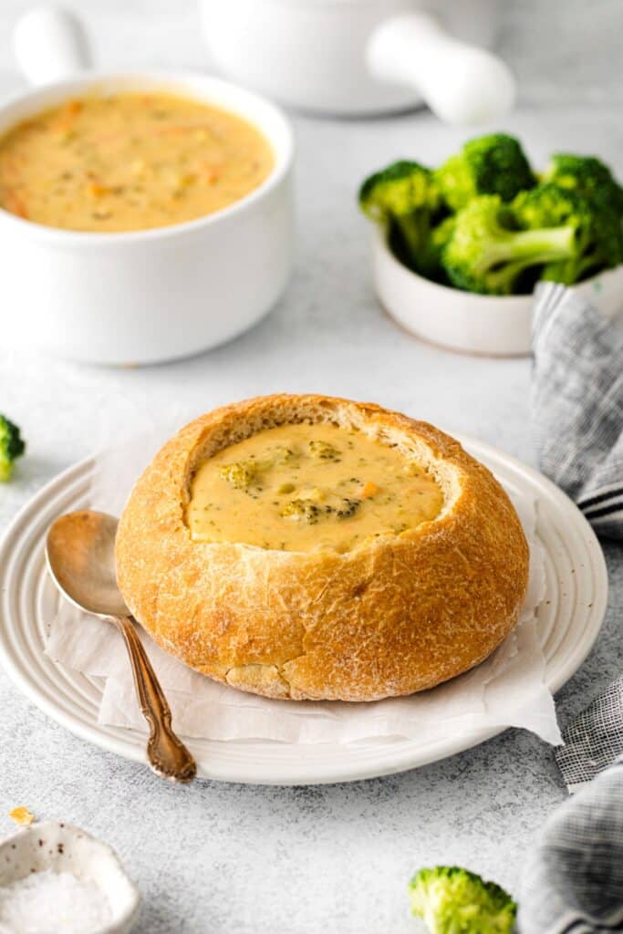 Panera broccoli cheddar soup in a sourdough bread soup bowl.