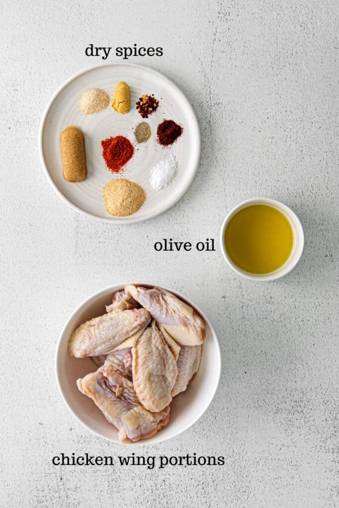 Ingredients for dry rub chicken wings recipe: chicken wing portions, olive oil and spices.