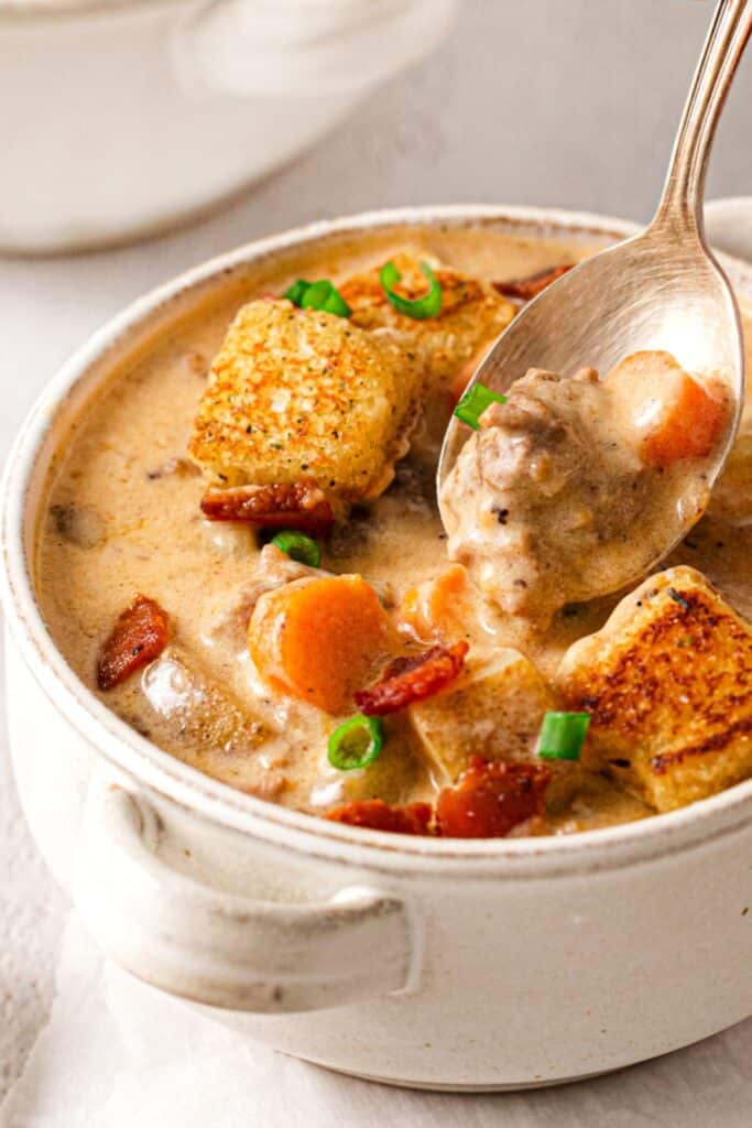 A spoonful of bacon cheeseburger soup.