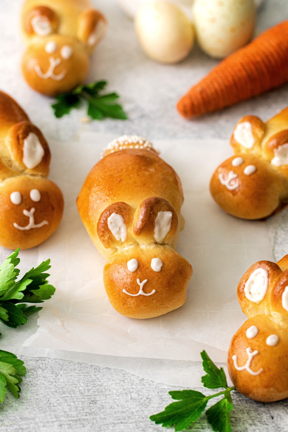 Batch of Easter Bunny bread rolls assembled from homemade yeast dough.