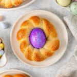 Traditional Italian Easter bread with a purple Easter egg in the middle.