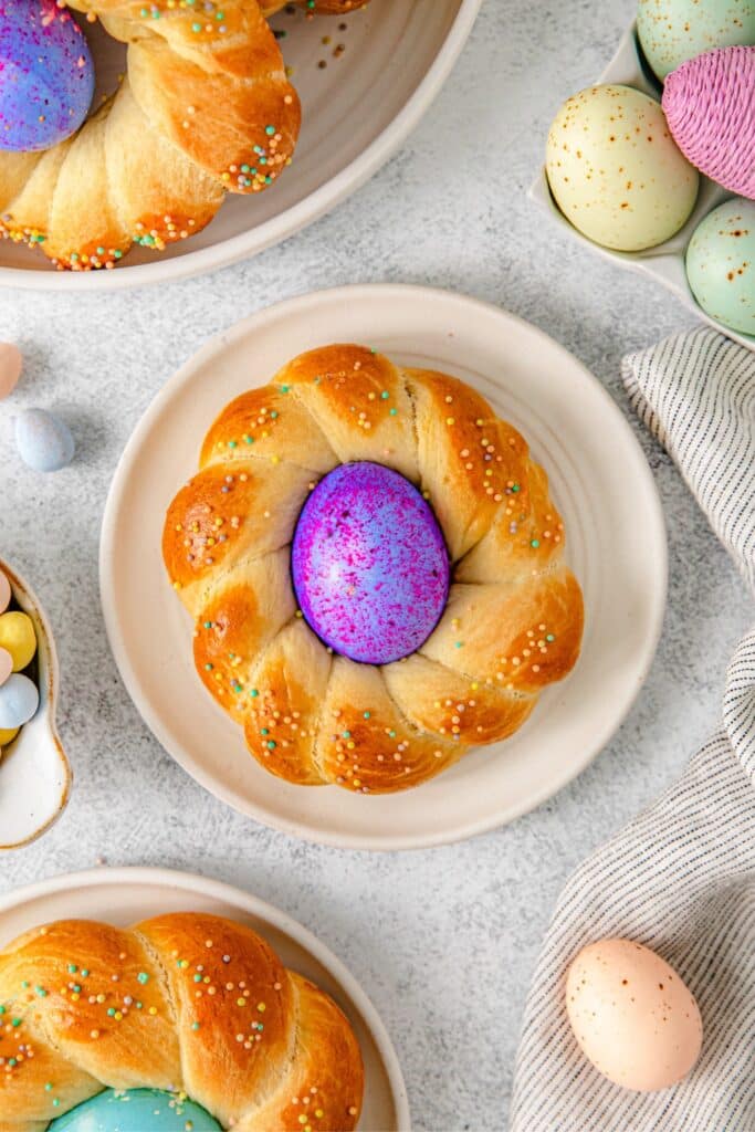 Traditional Italian Easter bread with a purple Easter egg in the middle.