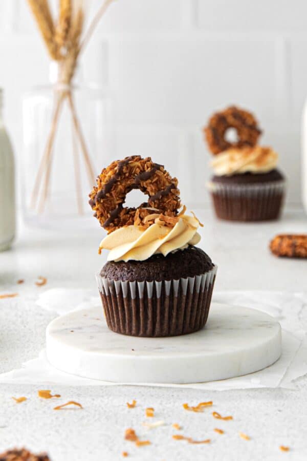 A German chocolate cupcake on a serving table.