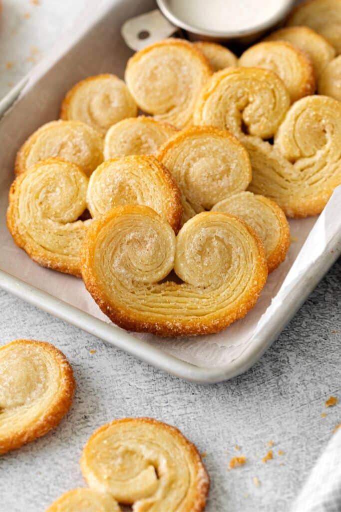 Elephant Ear Cookies arranged on a lined baking tray.