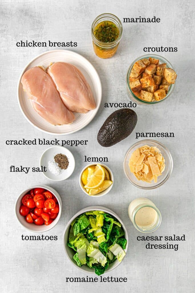 Ingredients for grilled chicken Caesar salad.