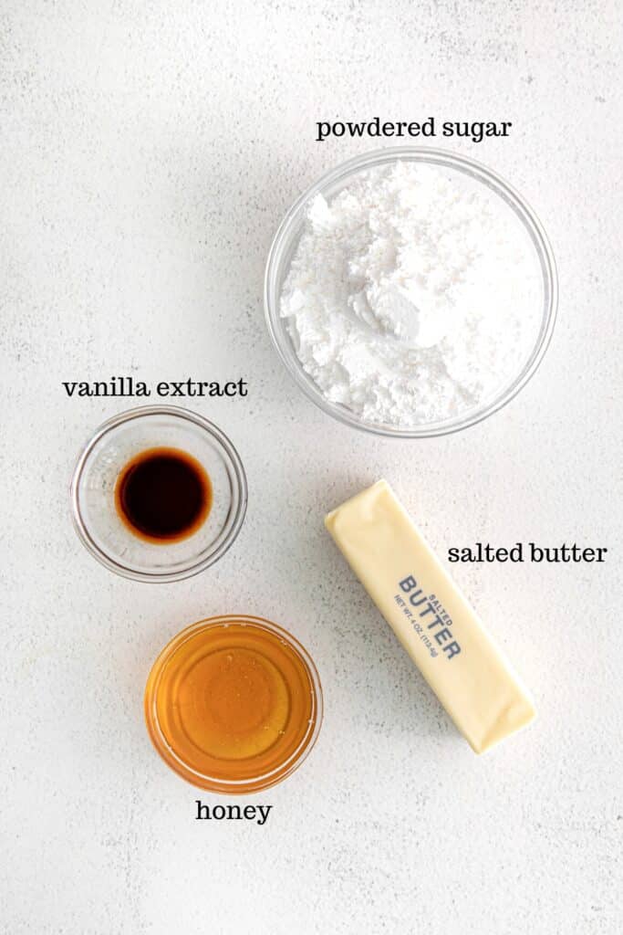 Ingredients for honey buttercream frosting.