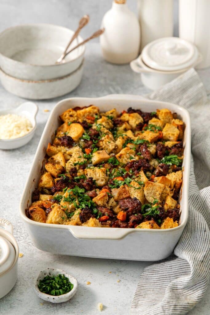 Italian sausage stuffing on a holiday serving table.