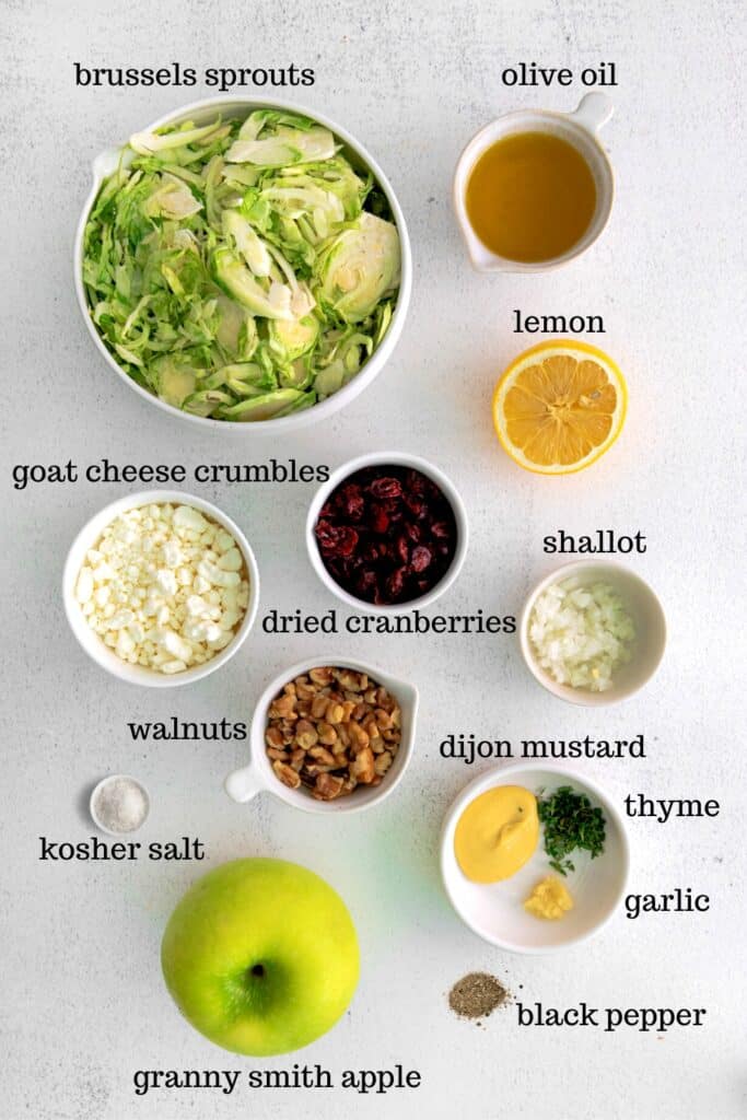 Ingredients for making shaved Brussels sprout salad with lemon vinaigrette.