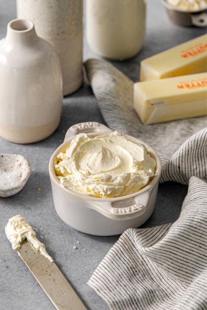 Whipped butter being served with a butter knife.