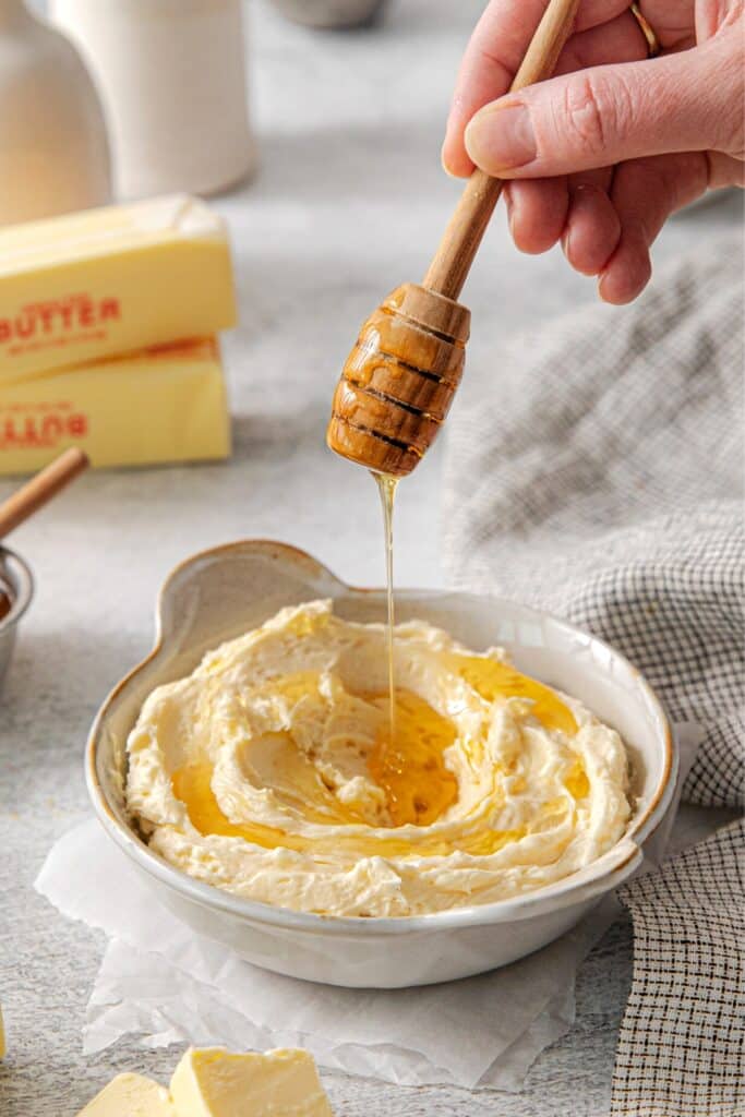 Whipped honey butter served in a ramekin.