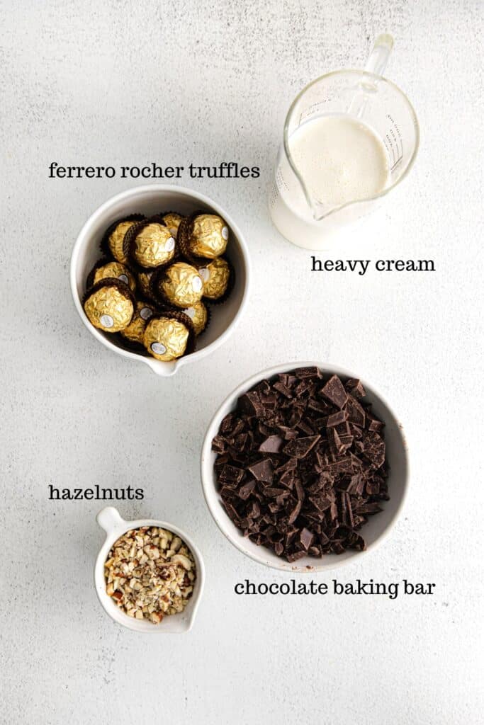 Ingredients for whipped chocolate ganache frosting, plus Ferrero Rocher chocolate truffles for adding on top.